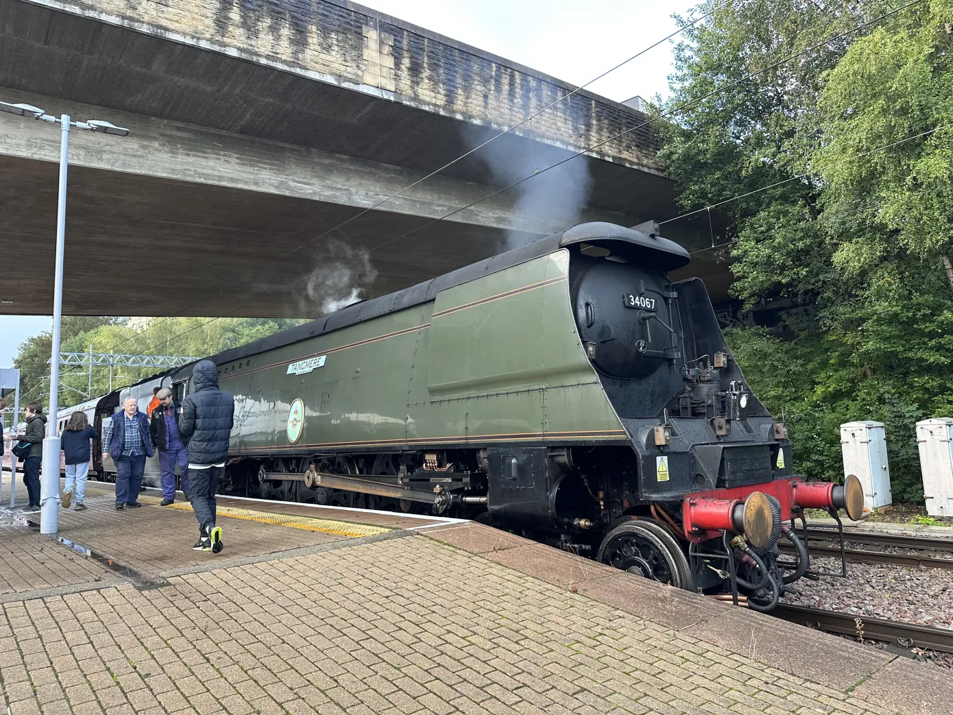 Tangmere steam engine under a bridge at Bradford Foster Square Railway Station