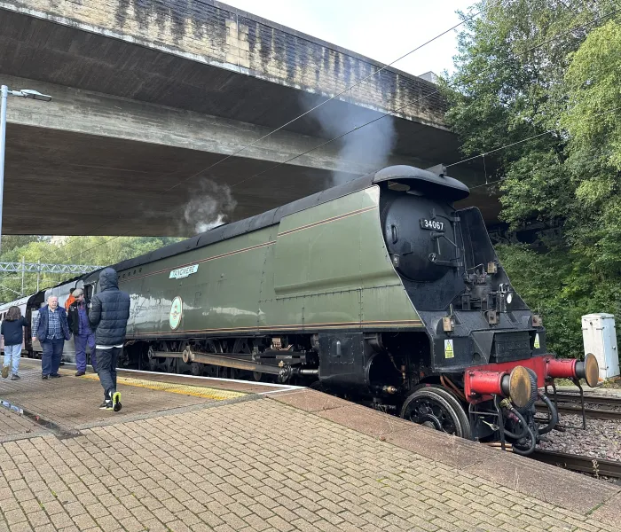 Tangmere steam engine under a bridge at Bradford Foster Square Railway Station
