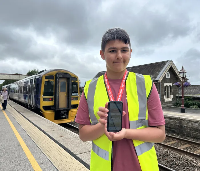 Young volunteer Kai Elliott gaining work experience this summer with the Settle Carlisle Traxplorer App.